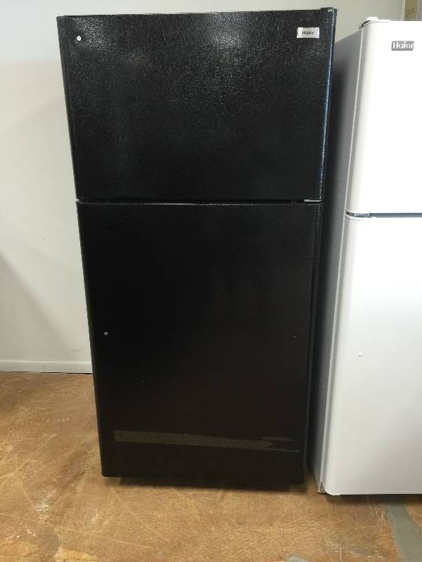 lot 104 image: The Haier HT21TS52SW 20.6 Cu. Ft. Top Mount Refrigerator  Freezer New