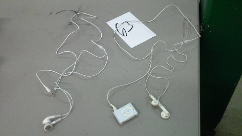 Ipod Shuffle with two sets of headphones