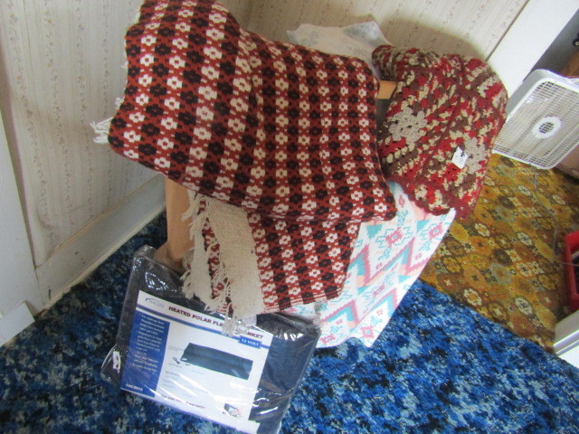 Quilt rack and assorted betting