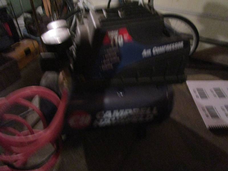 lot 59 image: Craftman Spreader (As is) Campbell Hausfeld Air Compressor