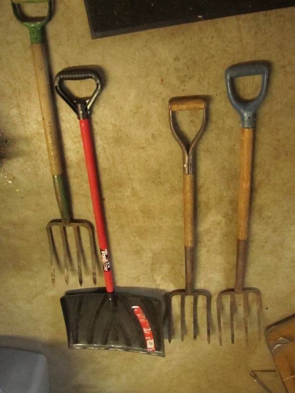 3 pitch forks and one snow shovel...