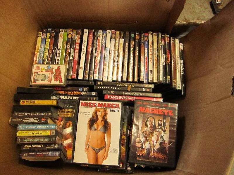 Box of movies and tapes new titles ...