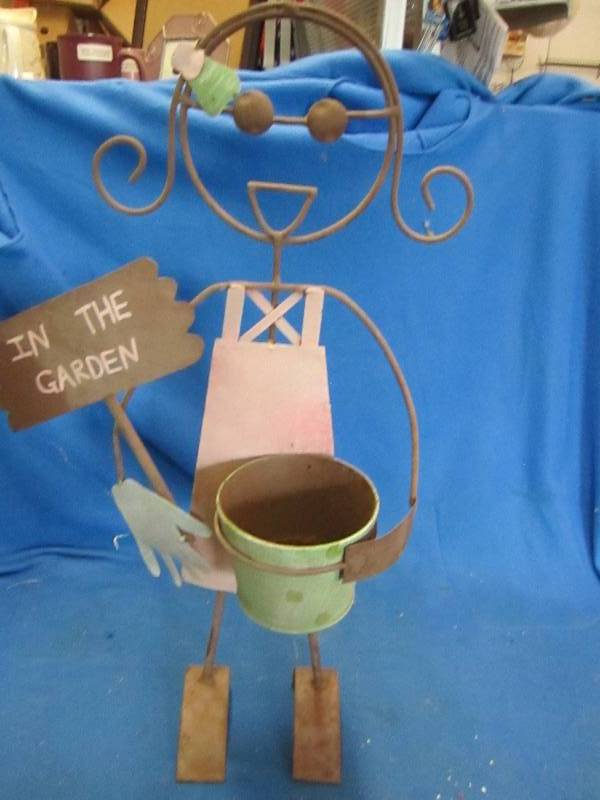 Garden metal figure of girl...