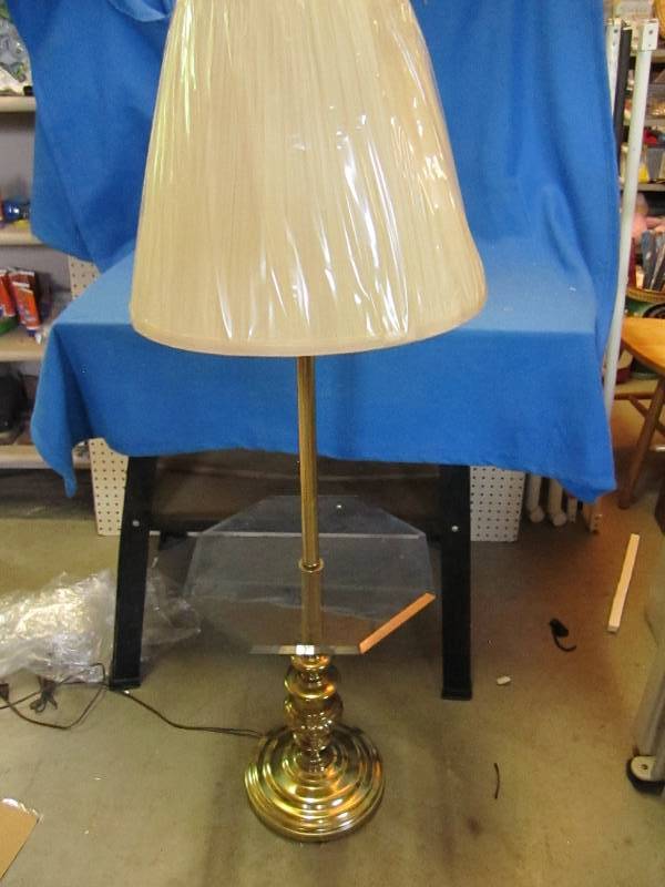 Lamp with shade and small glass tab...