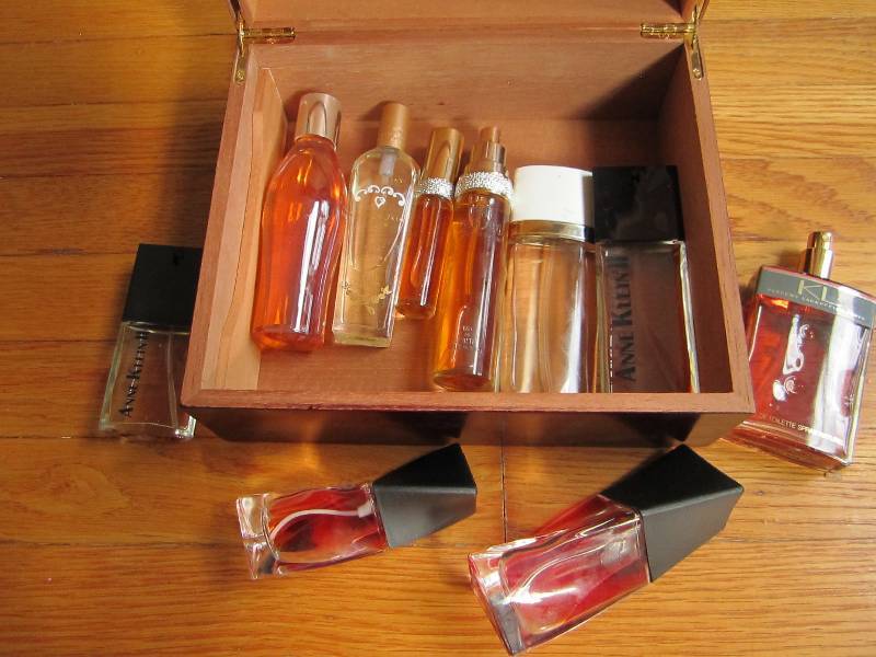 Wood box of perfume bottles...