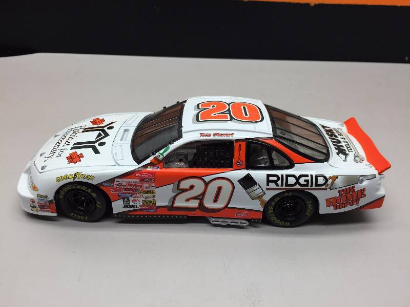 lot 3 image: TONY STEWART #20 HABITAT FOR HUMANITY 124 SCALE COLLECTIBLE CAR