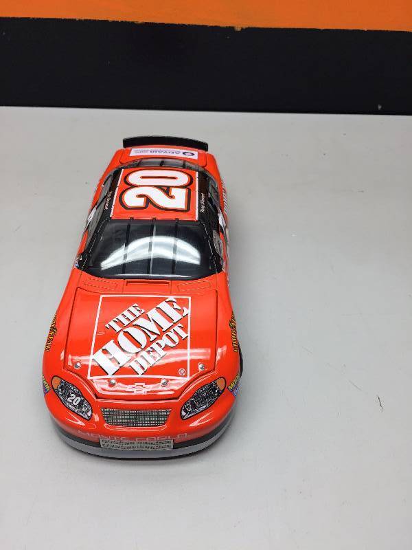 lot 4 image: TONY STEWART #20 NASCAR 2003 124 SCALE COLLECTIBLE CAR