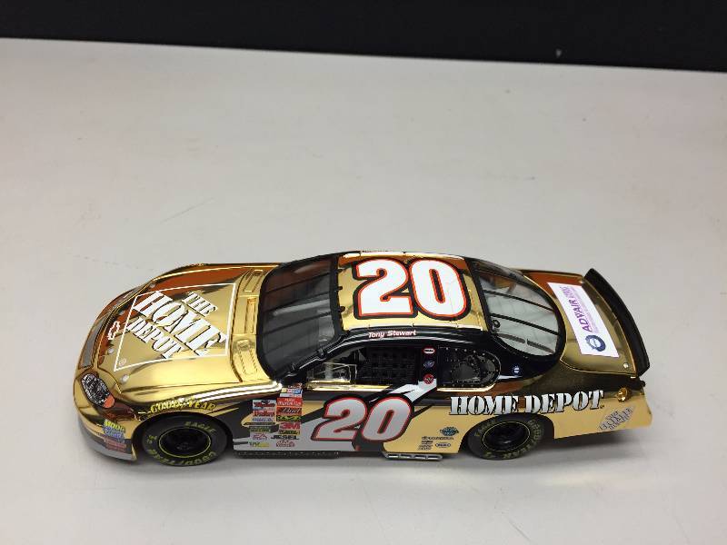 lot 6 image: TONY STEWART #20 NASCAR 2003 132 SCALE 24K GOLD PLATED CAR COLLECTIBLE CAR