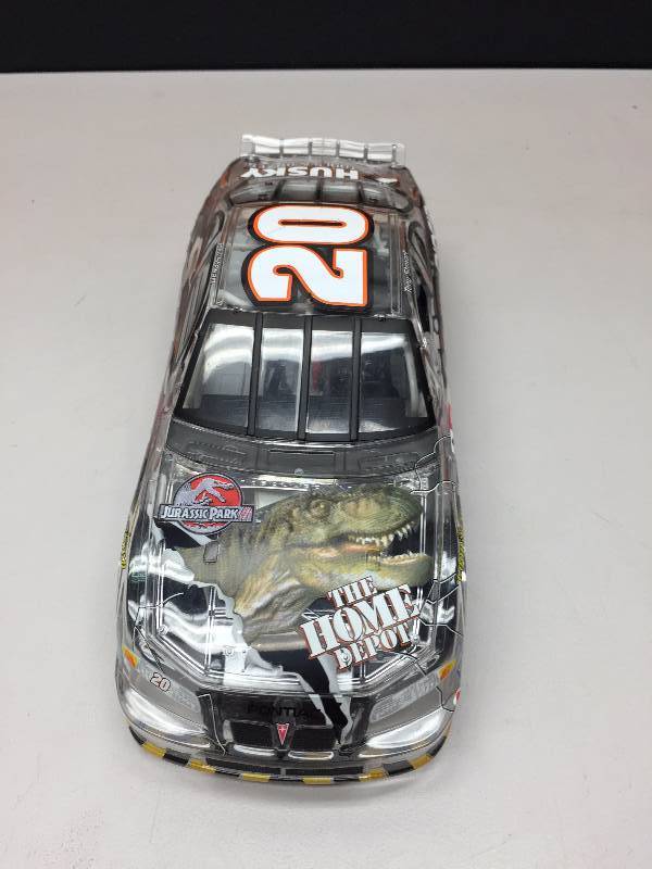 lot 9 image: TONY STEWART #20 CLEAR STOCK CAR 124 SCALE CAR COLLECTIBLE CAR