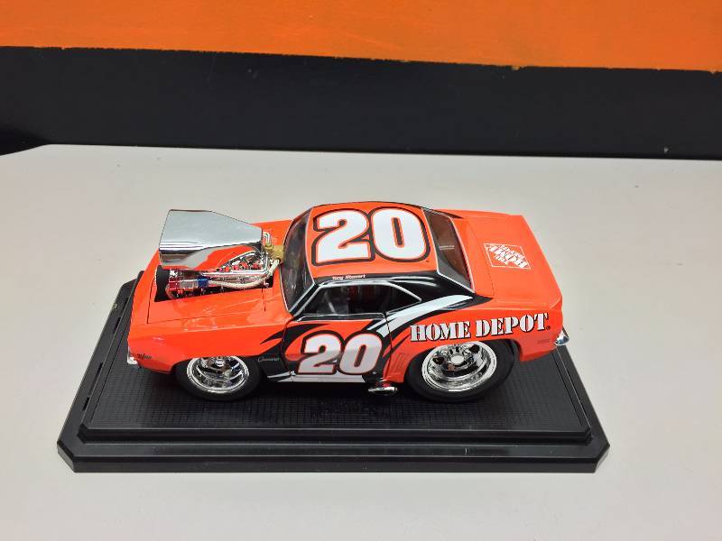 lot 19 image: TONY STEWART HOME DEPOT NASCAR MUSCLE MACHINE 1969 CAMARO 124 SCALE