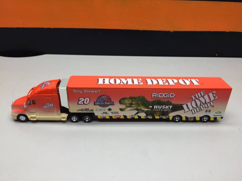 lot 20 image: TONY STEWART HOME DEPOT NASCAR MUSCLE MACHINE 1969 CAMARO 124 SCALE