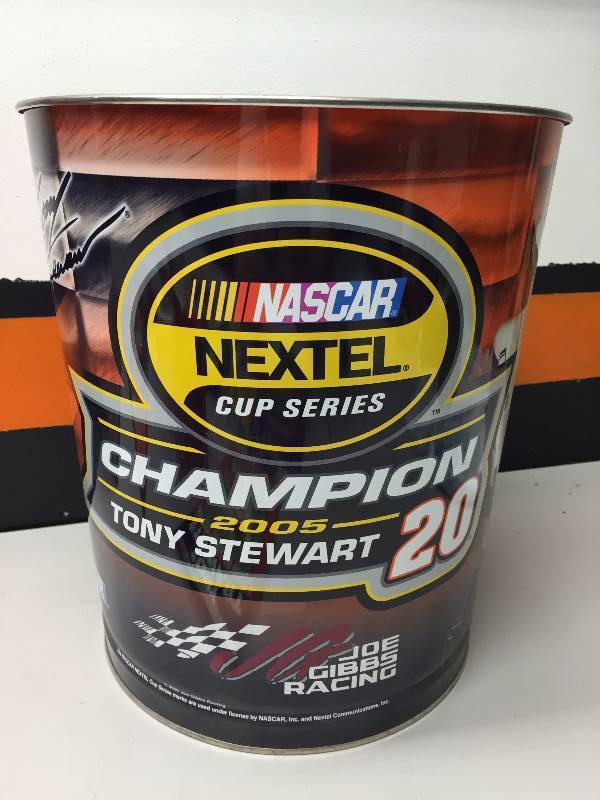 lot 28 image: TONY STEWART TRASH CAN,CAN COZYS, FLASHLIGHT, CORN FLAKES MINI CAR COLLECTION, SIGNED PICTURE VIRGIL HILL