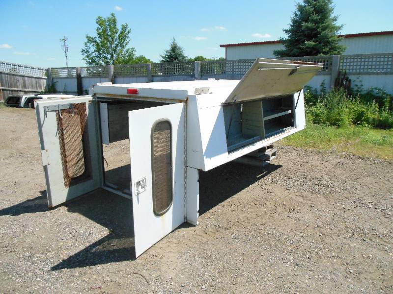 lot 2 image: Steel Contractor Tool Truck Topper by Leo Mfg. - with Key