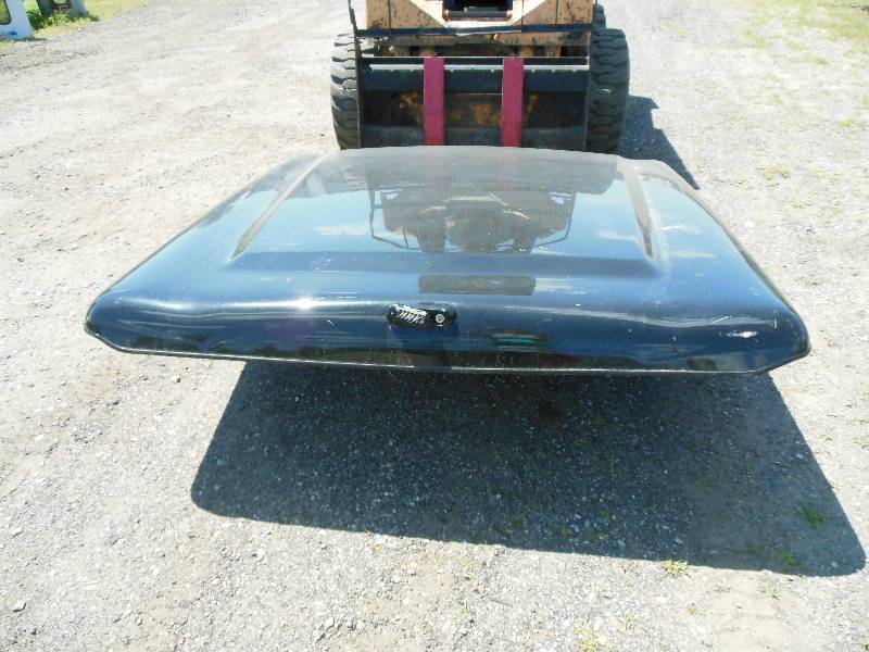 lot 94 image: Hard Fiberglass Lid  Cover from mid 2000s short bed Chevy ARE Manufacturing.