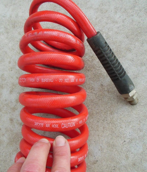 lot 24 image: Air Hose - approx. 15 ft of 38 200 psi max hose