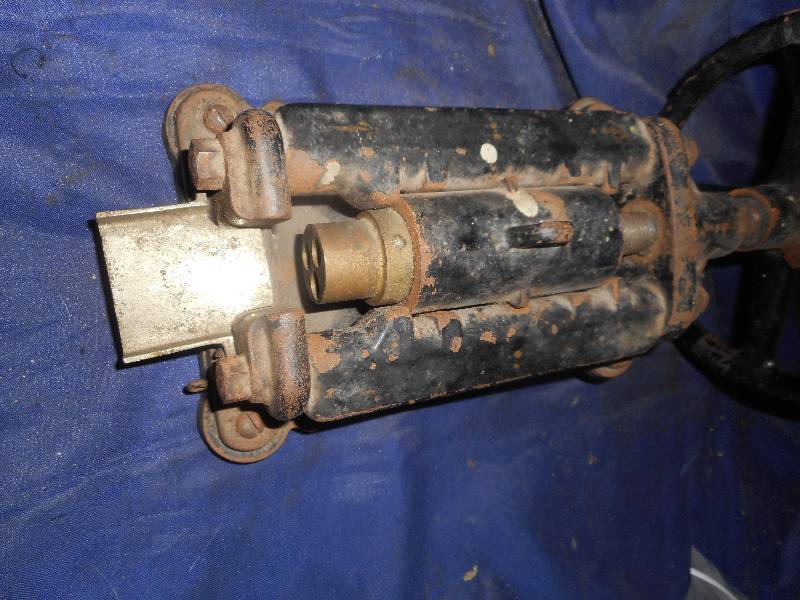 ANTIQUE IRON EXTRUDER