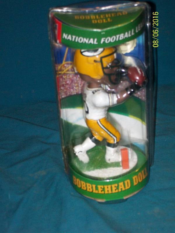lot 18 image: Vintage Green Bay Packers Bobble Dobbles. Bobble Head Doll NFL Driver #80 Green Bay Packers.