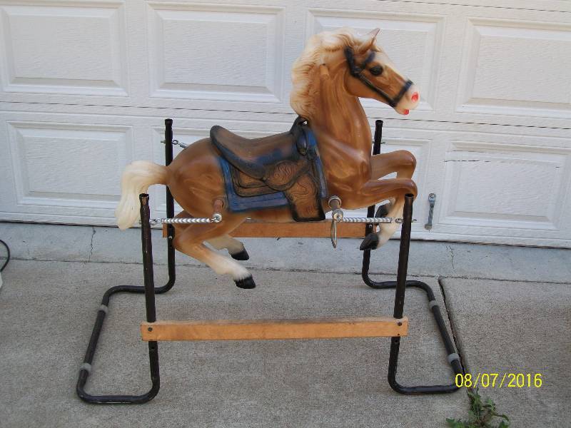 old rocking horse with springs