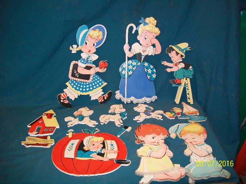 lot 39 image: Vintage Pressed Cardboard Pin Up Dolly Toy Wall Plaques & Various Mother Goose Nursery Rhymes Art