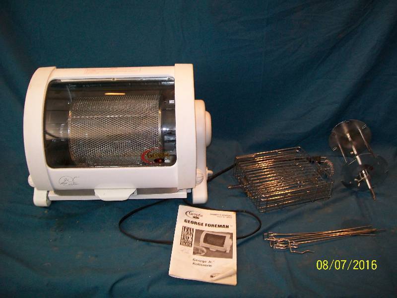 lot 34 image: George Foreman George Jr. Rotisserie. Model# GR8B2