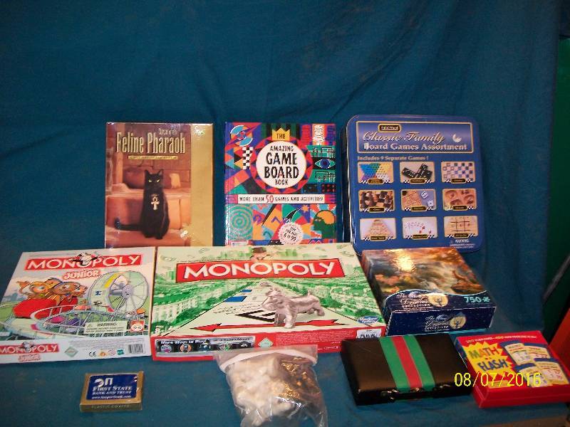lot 41 image: Various Vintage Board Games. Monopoly JR, Monopoly, Amazing Game Bd Book Travel, ETC. See Pictures
