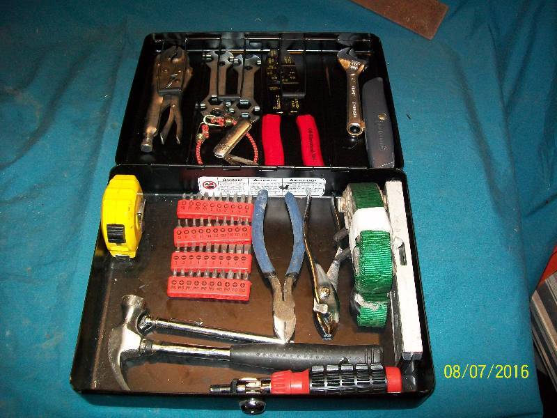 lot 52 image: Metal Cash Box Filled with Tools. See Picture. Box Approx. 12 x 10-18 x 4 when closed