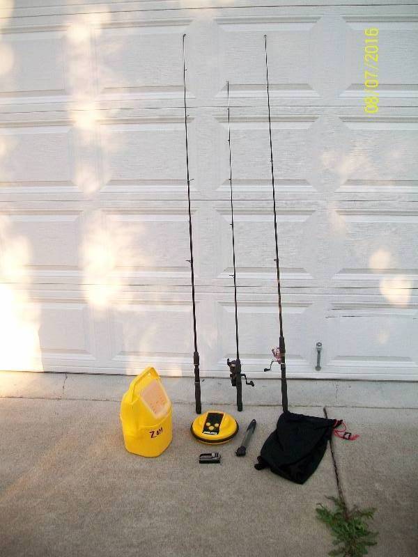 lot 49 image: Outdoor Bundle Fishing Rods, Camp Chair, Pool Buoy Radio, Minnow bucket, etc. See Pictures.