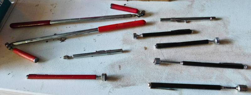 lot 29 image: lot of retractable magnet reachers