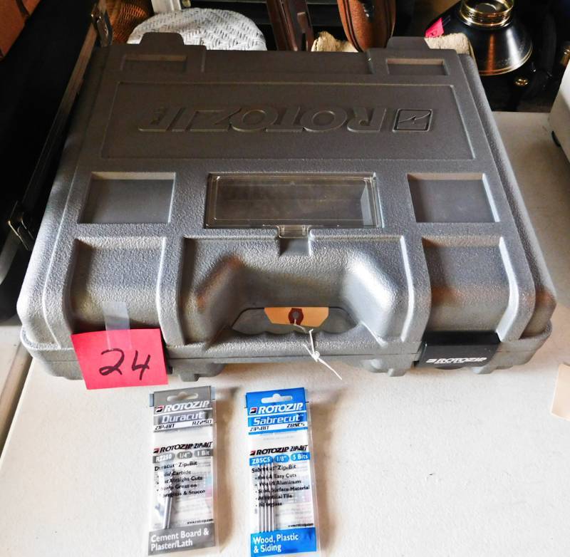 lot 24 image: rotozip with case and accessories.