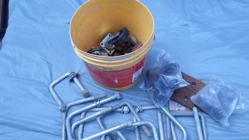 lot 16 image: Bucket filled with Castors and U bolts