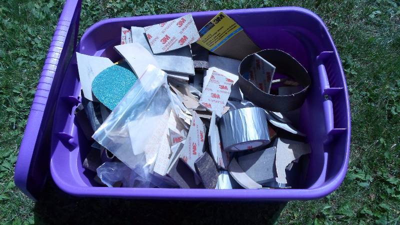 lot 19 image: Tote FILLED with Sand Paper and misc. items