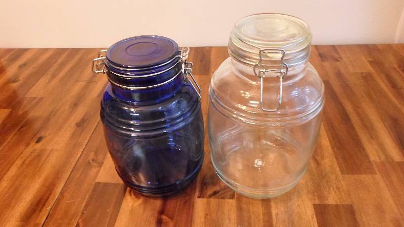 lot 50 image: 2 Jars with bucket lids
