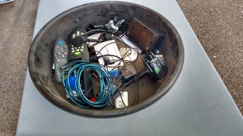 lot 111 image: Oil Pan Filled with PS2 and Xbox Items