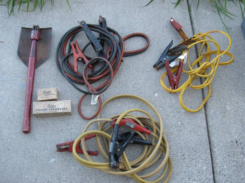 lot 049 image: Tub, Folding Mini Shovel, Jumper Cables (3) & Piston Expanders