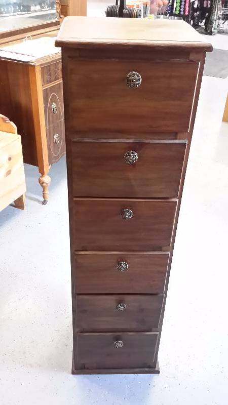 Dark stained wooden vanity tower