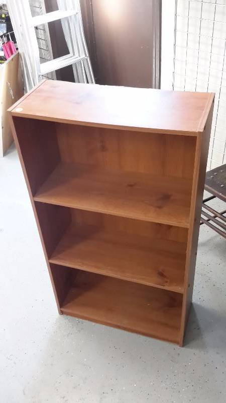 Brown composite wood bookshelf