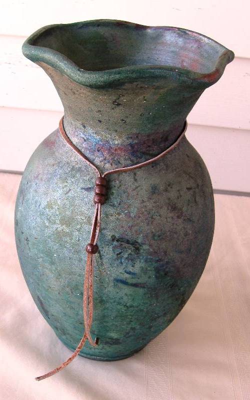 lot 091 image: Southwestern Handcrafted Vase & Oil Lamp