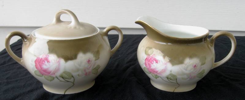 lot 097 image: Vintage German Porcelain Sugar & Creamer & Teapots