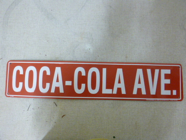 lot 107 image: Metal Coca-Cola Street Sign