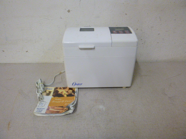 lot 118 image: Oster Deluxe Bread and Dough Maker
