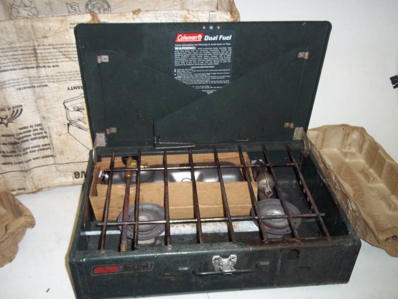 lot 31 image: Coleman dual fuel stove with box