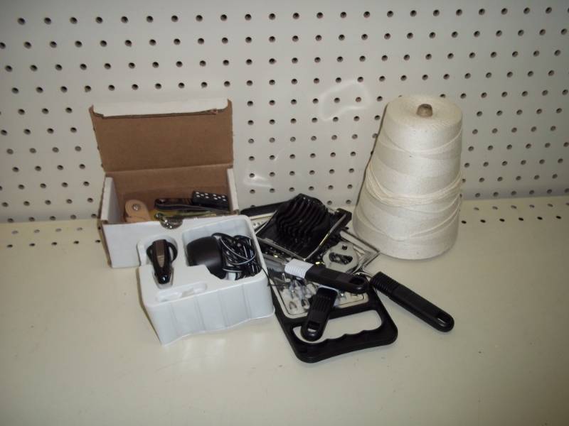 lot 211 image: Kitchen gadgets and key chains Hearing amplifier