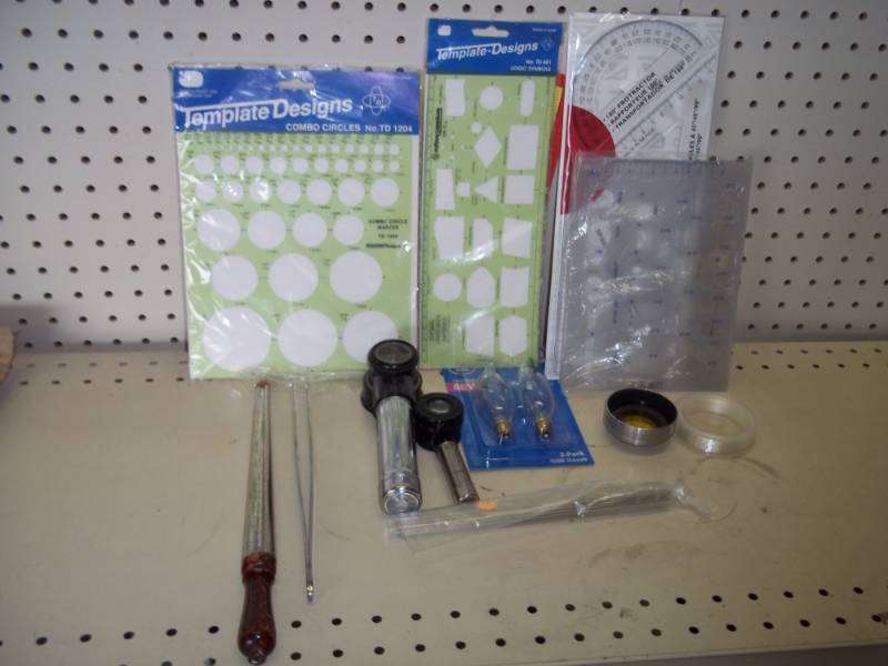 lot 261 image: Drawing templates and tweezers and magnifier