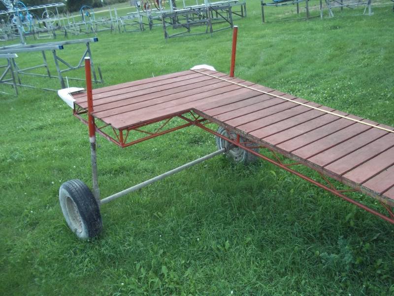 lot 395 image: 21 Steel Roll in dock with wood decking and patio