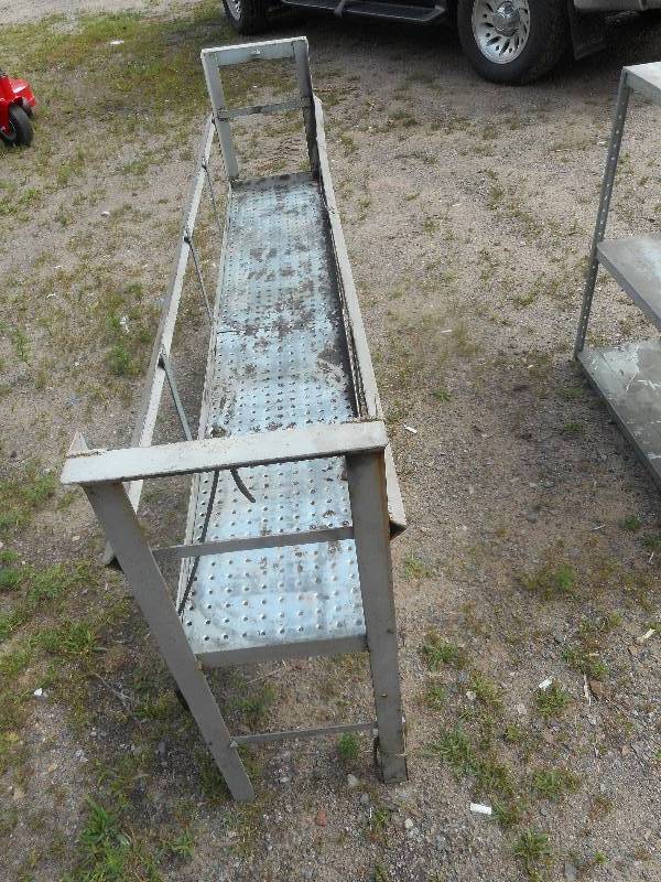 OIL CAN OR PAIL RACK