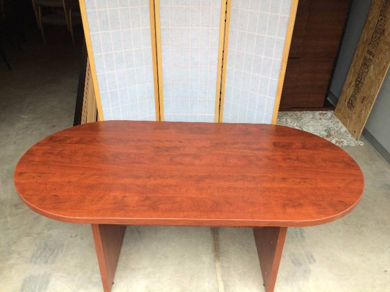 Beautiful Cherry Wood Finish Small Conference Table - Excellent Condition On Top - Has a small scuff on side and a chip in the base