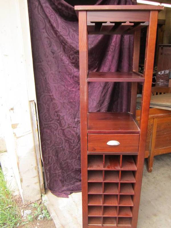 lot 19 image: Wine rack, 17 wide  66 tall...