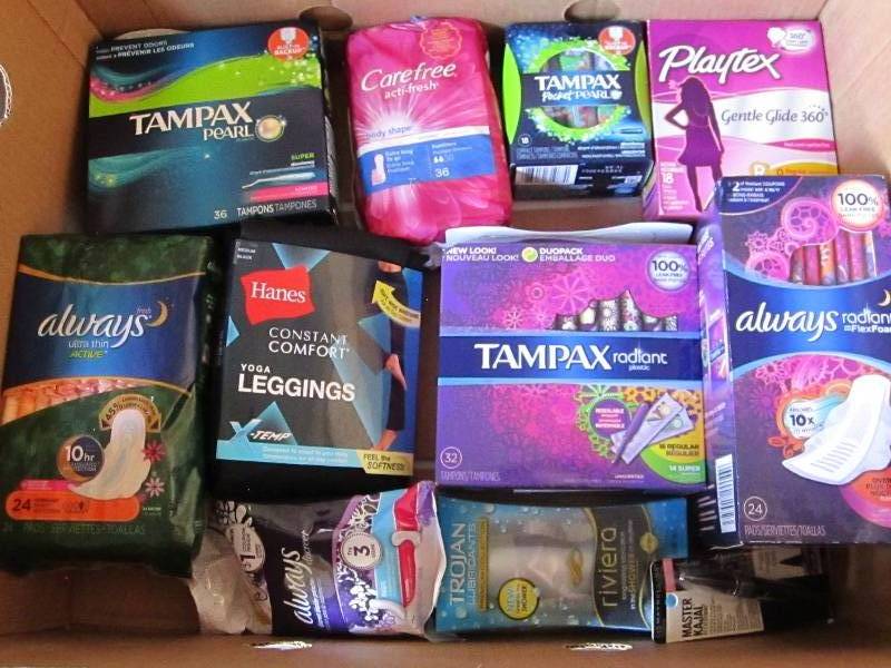 lot 55 image: Box of feminine products...
