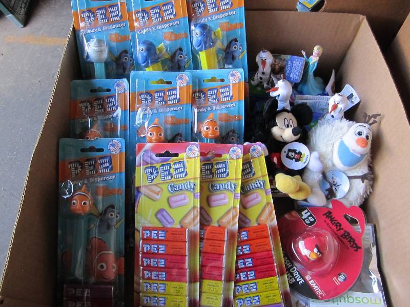 lot 74 image: Box of Nemo, Frozen and other toys...