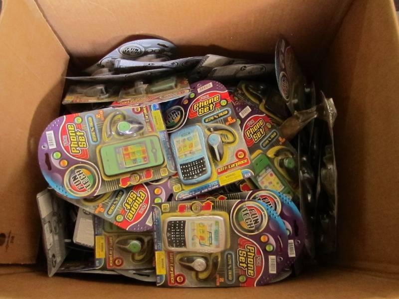 lot 111 image: Huge lot of toy games, phones, and ...